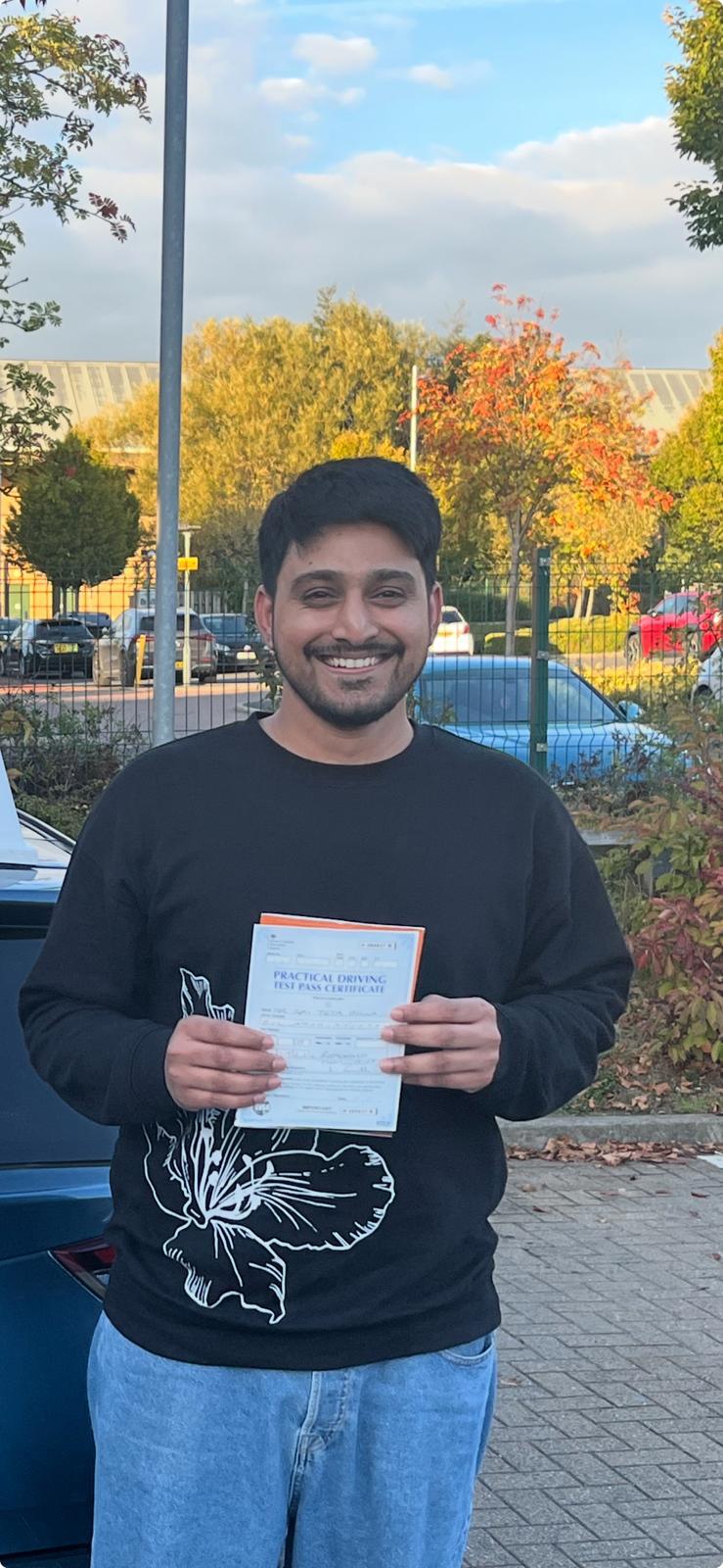 Student celebrating passing their driving test