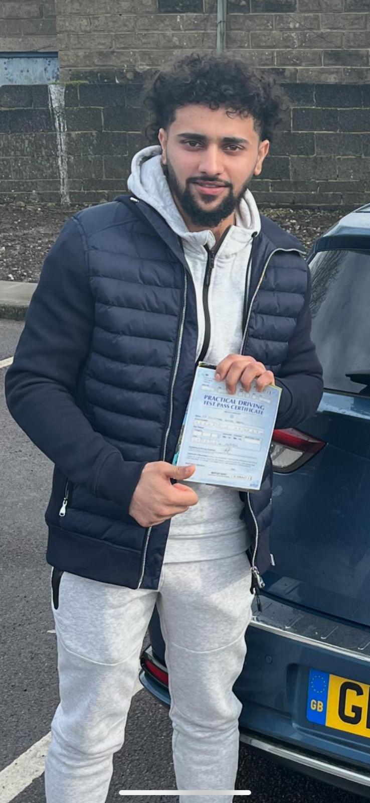 Student celebrating passing their driving test